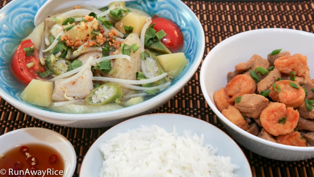 A traditional Vietnamese meal of Sour Soup with Braised Pork and Shrimp