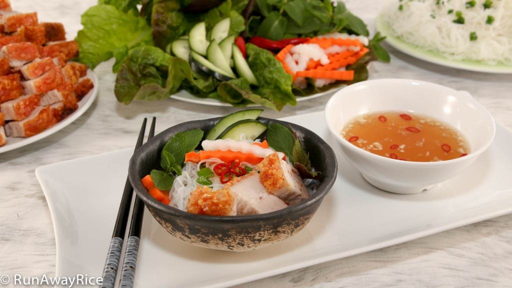 Serve the Crispy Roast Pork with Fine Rice Noodles, Fresh Herbs, Carrot and Radish Pickles and Fish Sauce Dipping Sauce for a truly delicious Viet meal!