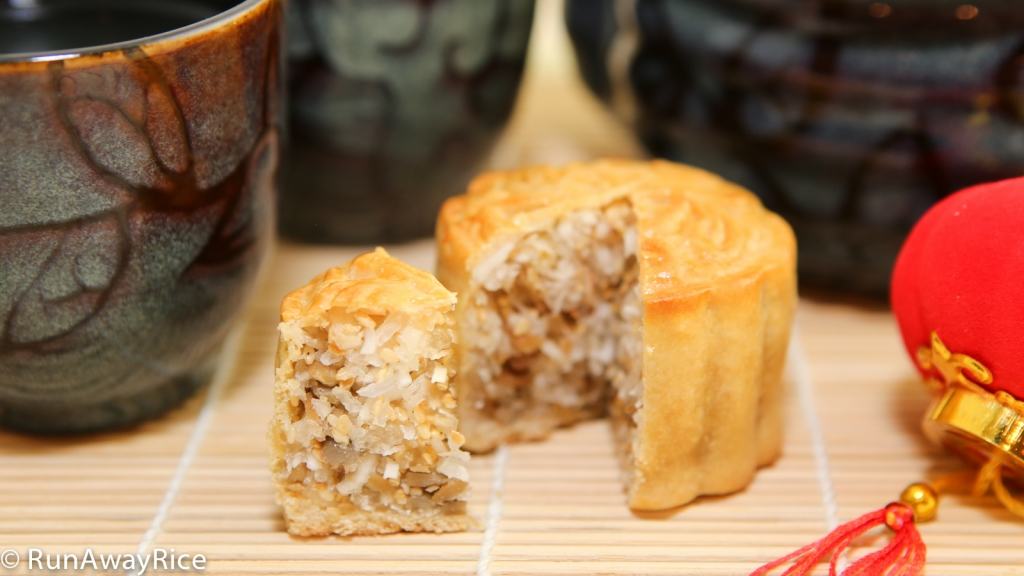 These mooncakes have a sweet filling made of coconut, sunflower and sesame seeds. Yum! | recipe from runawayrice.com