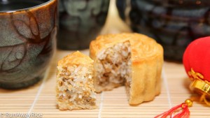 These mooncakes have a sweet filling made of coconut, sunflower and sesame seeds. Yum!