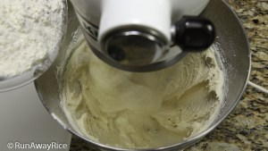 Making Cream Cheese Spritz Cookie Dough-Add Flour | recipe from runawayrice.com