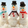 Snowman Snowball Cakes - coconut-covered glutinous cakes made into cute little snowmen | recipe from runawayrice.com